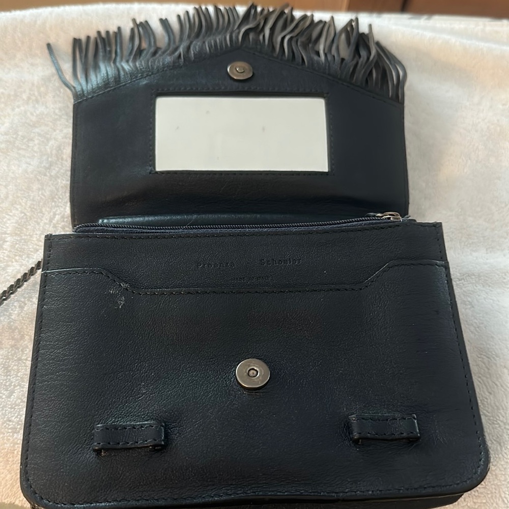Proenza Schouler blue leather fringed wallet on a chain crossbody bag